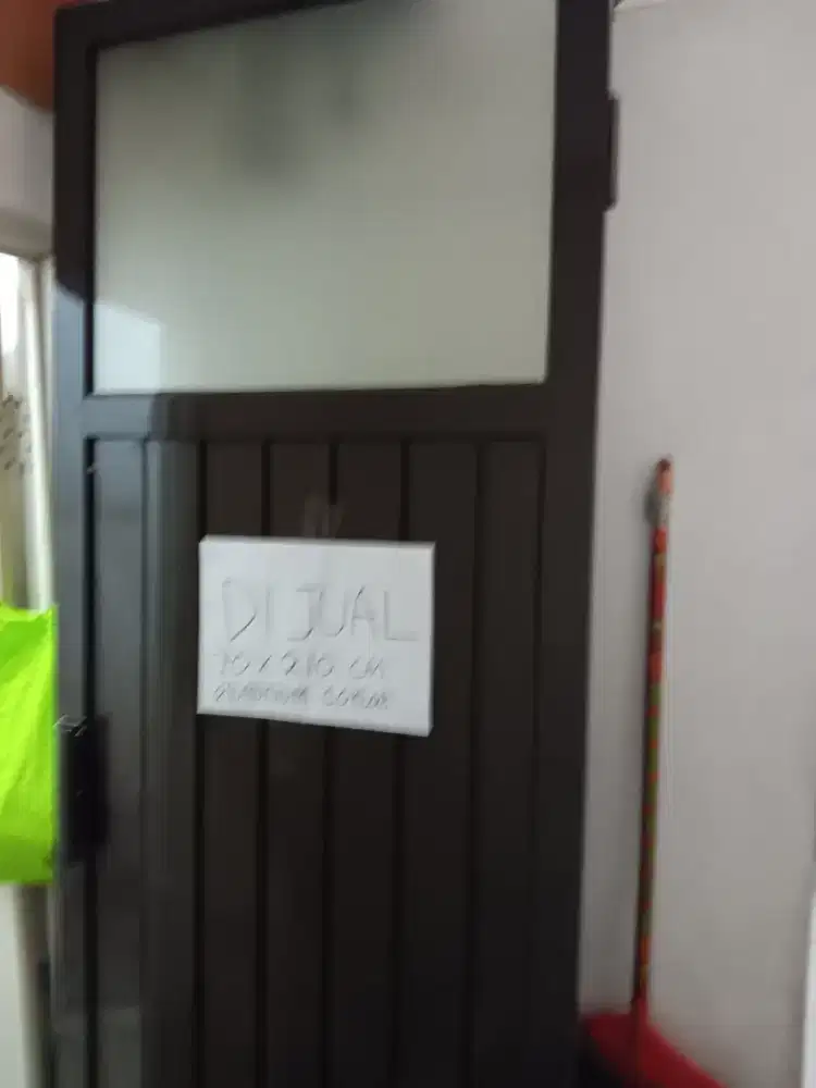 Pintu kmr mandi alumuniun coklat