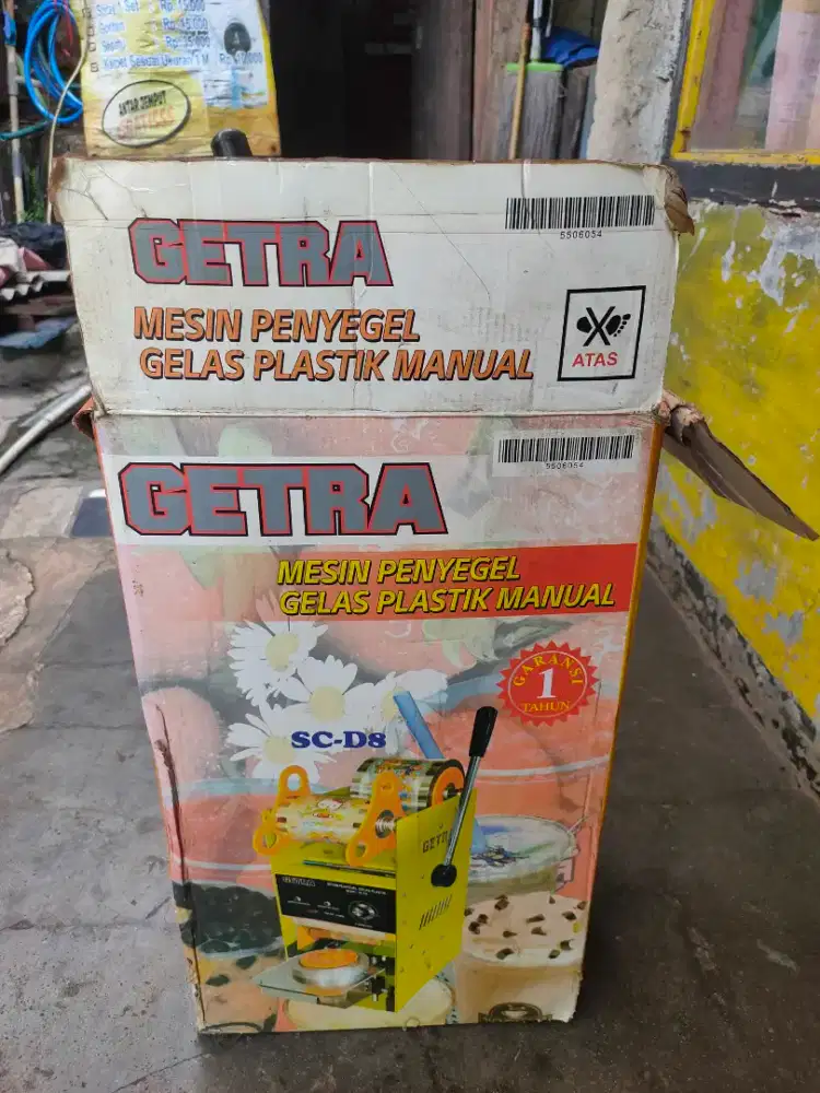 Mesin pres es caup