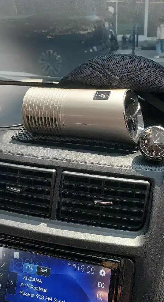 Air purfier sharp untuk mobil