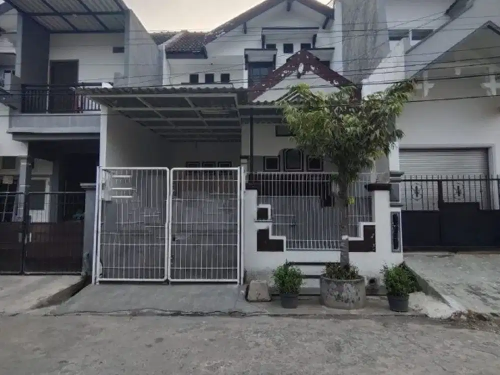 Rumah Siap Huni Babatan Pantai Hadap Timur Row Jalan 2,5 Mobil Ada Halaman Belakang