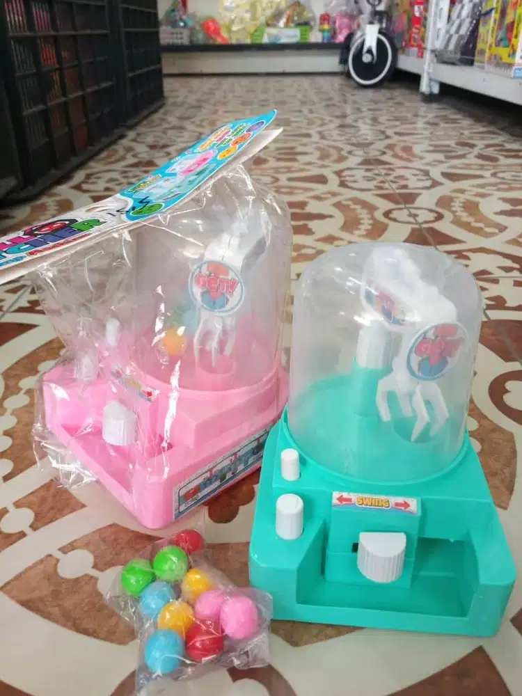 mainan anak capit boneka