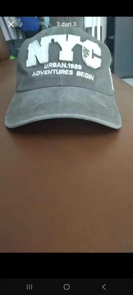 Topi NYC masih baru