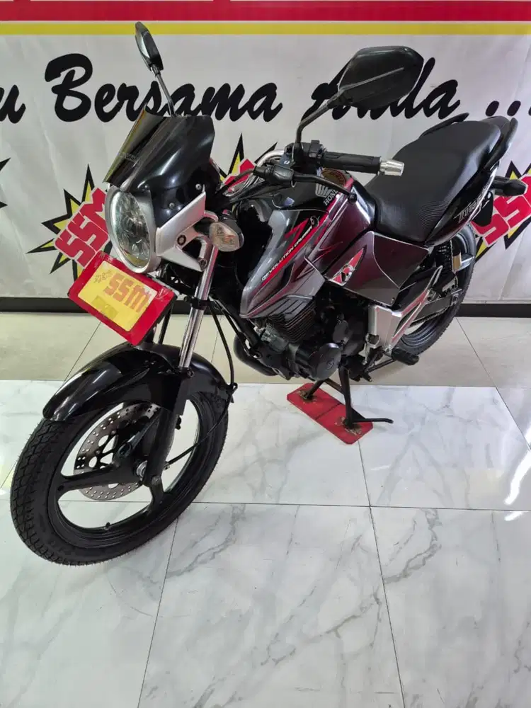 Tiger Revo cw 2012 plat L joss