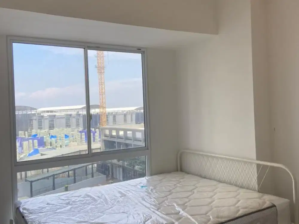 Jual Apartemen Tokyo Riverside PIK 2 – 2BR Semi Furnish Lantai Vinyl– View Kolam