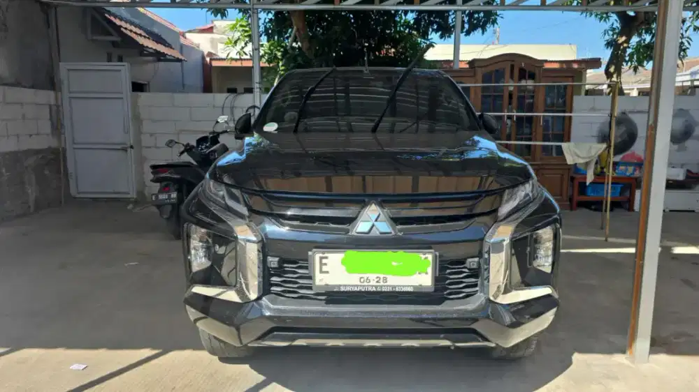 For sale new triton DC ultimate 4x4 AT ini 2023 hitam km 84 rban