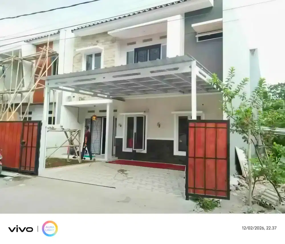 Kanopi baja ringan dan garasi