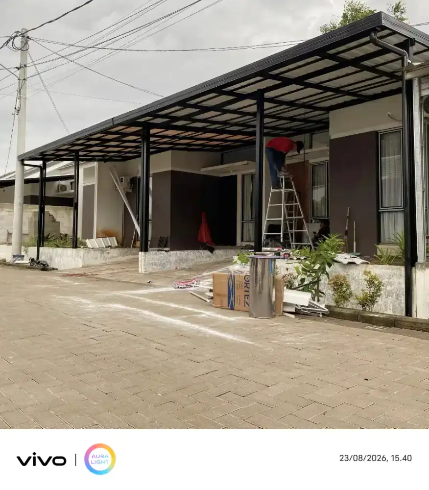 Kanopi baja ringan dan garasi