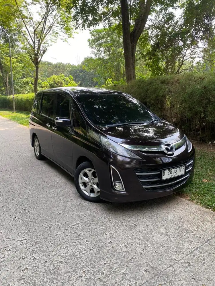 harga cash mazda biante at 2013 pajak on low km