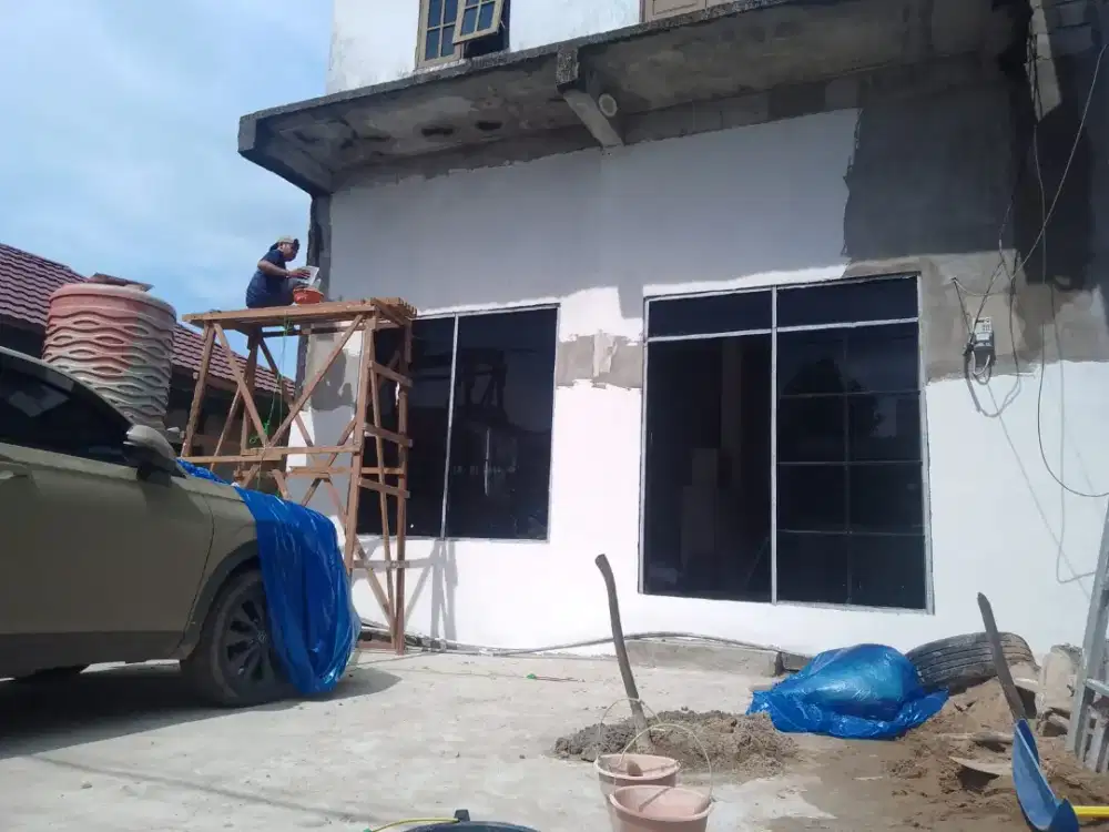Tukang kayu dan batu bjm