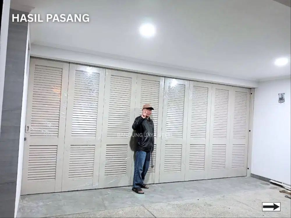Pintu Garasi Sliding Lipat Model Henderson