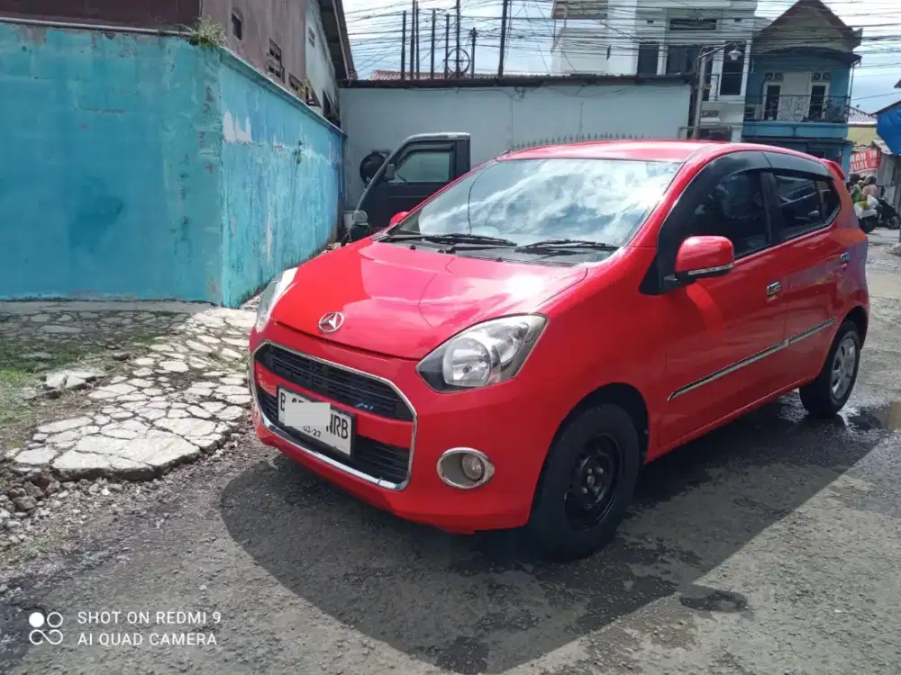 TDP 3 JUTA DAIHATSU AYLA X MANUAL 2017 MERAH