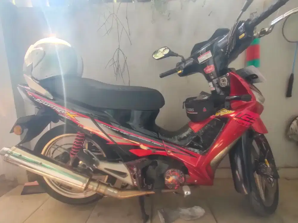 Supra x 125 fullpaper