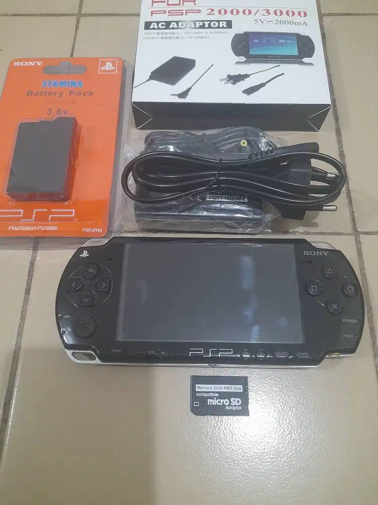 Psp slim seri 2000 Mulus No Mines Memory 8gb Full game Plus Cassan