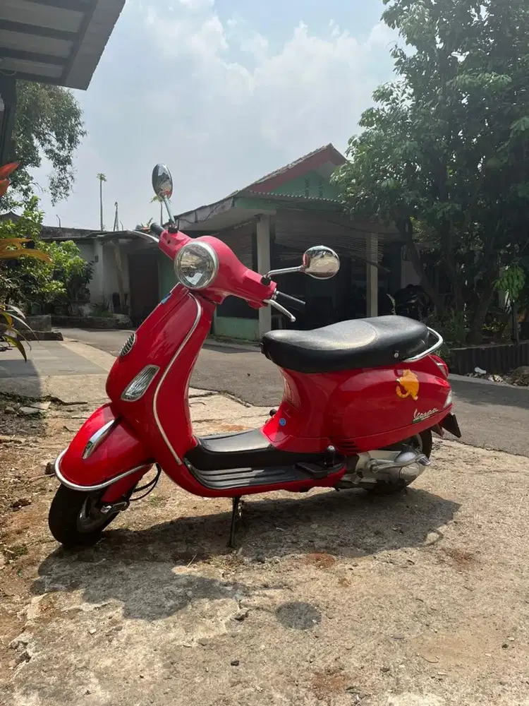 Vespa lx 125 thn 2012