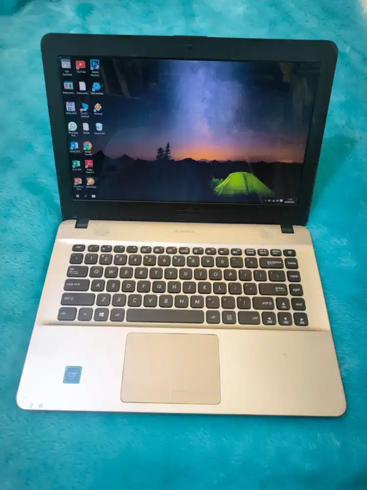 Dijual laptop asus x441s slim,intel celeron ram 2 gb,320 gb.siap pakai