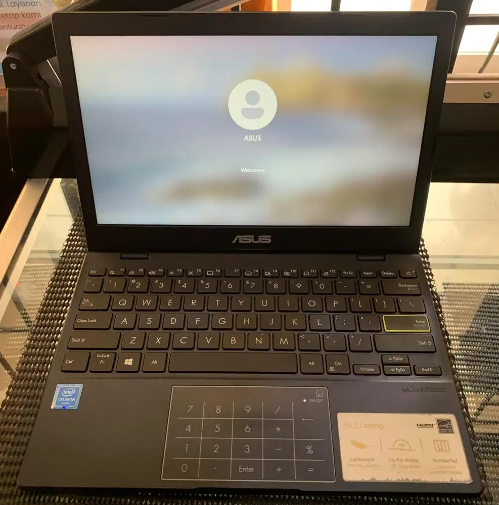 JUAL LAPTOP ASUS VIVOBOOK E210MA, CELERON, 4/500GB MURAH DI BALIKPAPAN