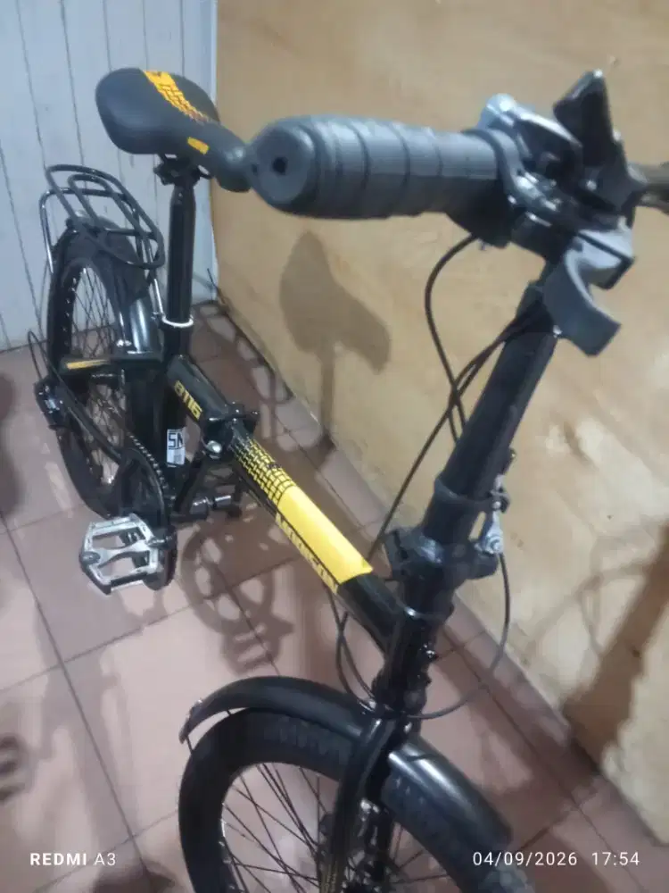 Sepeda lipat 99 % baru