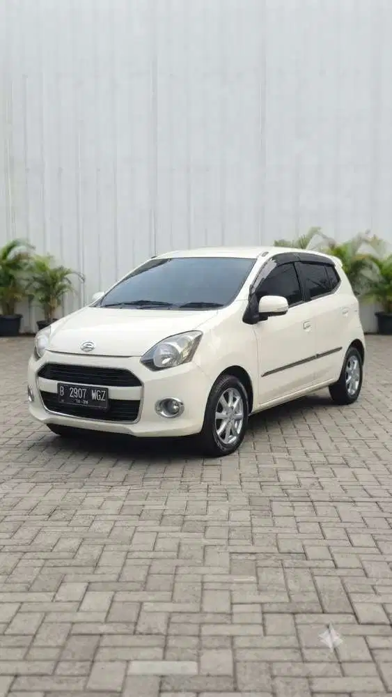 CASH jual cepat Daihatsu Ayla 2015 x manual Bensin terawat