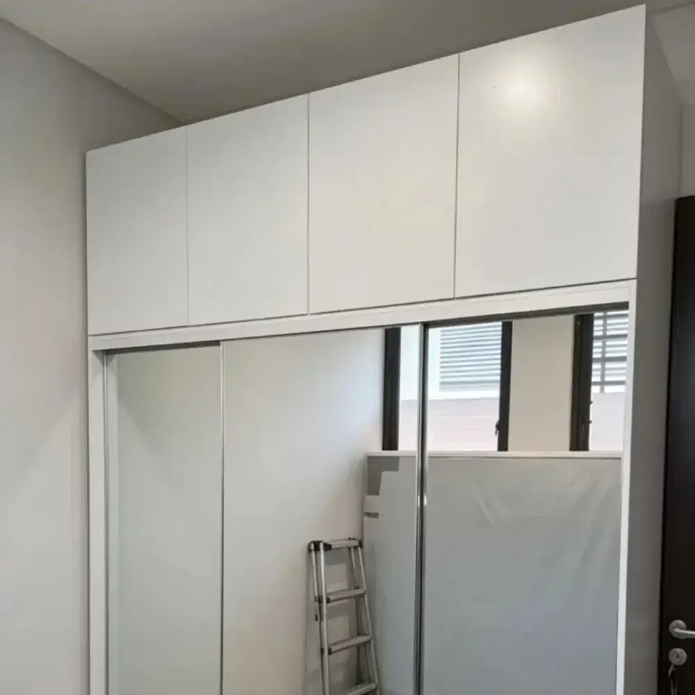 Lemari pakaian sliding door pul cermin