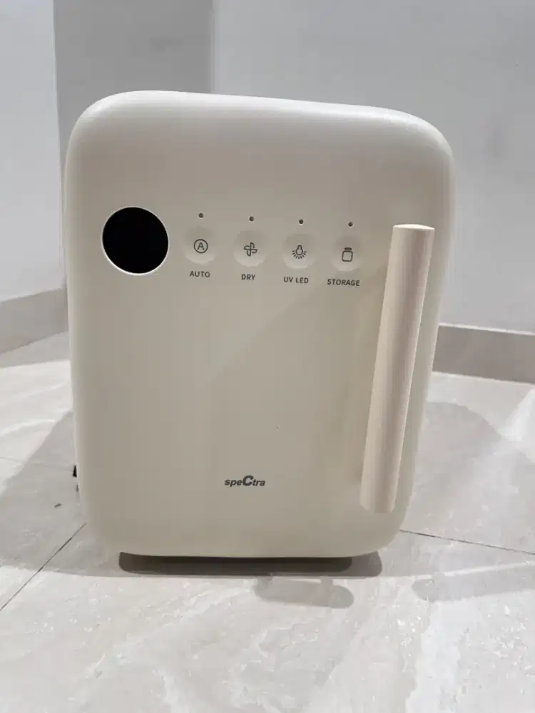 Alat Sterilisasi Botol dan Peralatan Bayi Merek Spectra.
