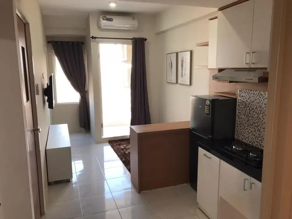 Disewakan Apartemen Puncak CBD Furnished 2 BR Siap Huni REV.A1071
