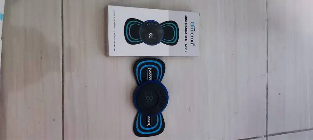 TaffOmicron Alat Pijat Elektrik