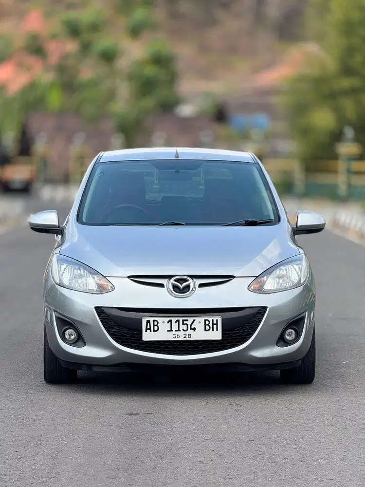 DP 20 JUTA (MAZDA 2 HB V 2012 MATIC)