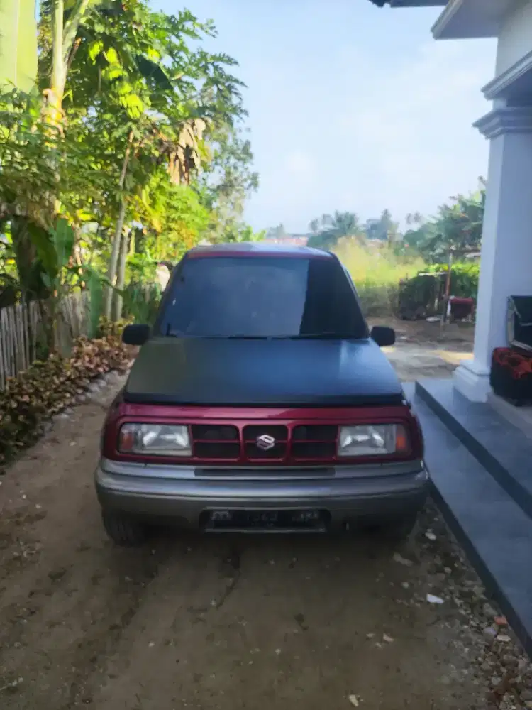 DiJual: Suzuki Escudo Nomade Manual (Red Maroon)