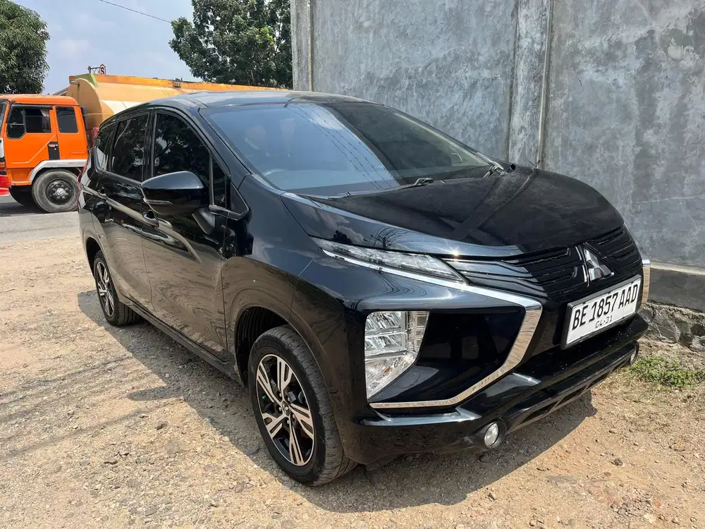 XPANDER MANUAL HITAM 2021