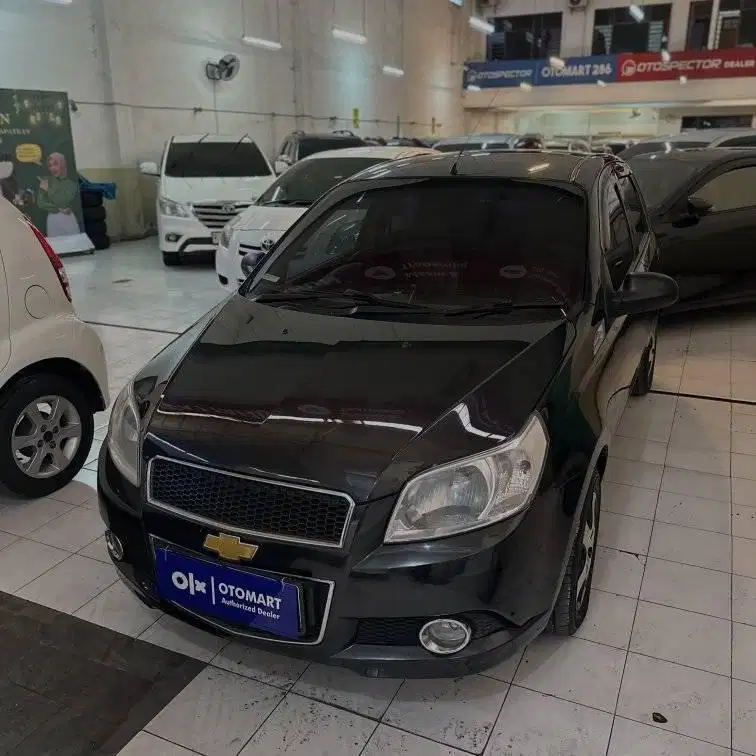 CHEVROLET 2009 AVEO 1.4 M/T HITAM MURAH OTOMART 286 KENJERAN