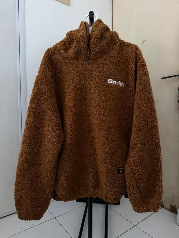 Jaket Tebal Bulu Bulu warna cokelat.