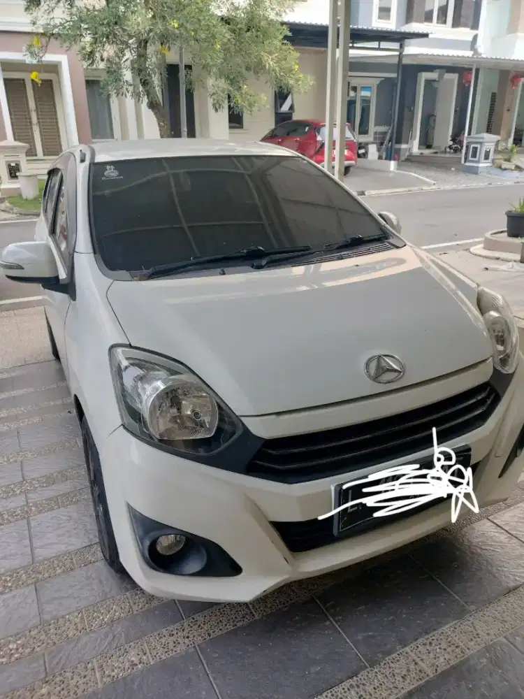 Ayla putih, 1.0 X AT, tgn 1, km 34.500 thn surat 2022, pajak hidup
