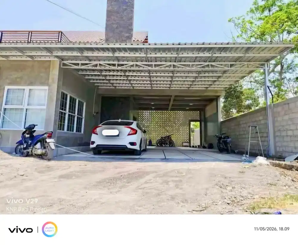 Kanopi baja ringan dan garasi