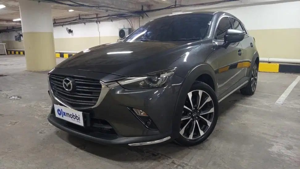 DP MURAH Mazda CX-3 1.5 Sport Bensin-AT 2022 Abu CHFYB