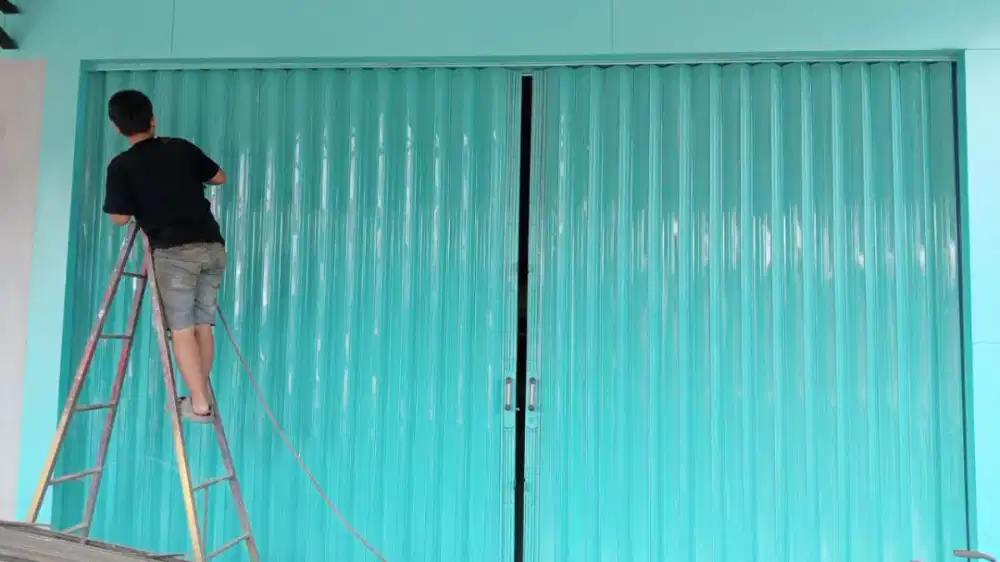 Pintu folding gate besi