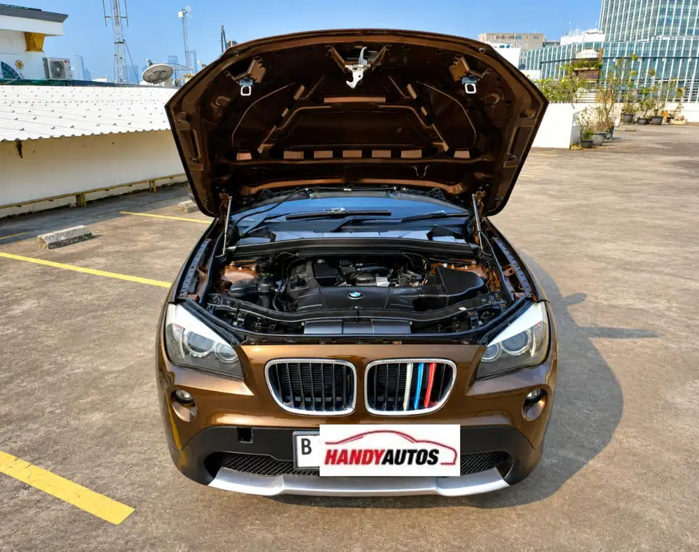 BMW X1 Executive 2011 Automatic Coklat Metalik