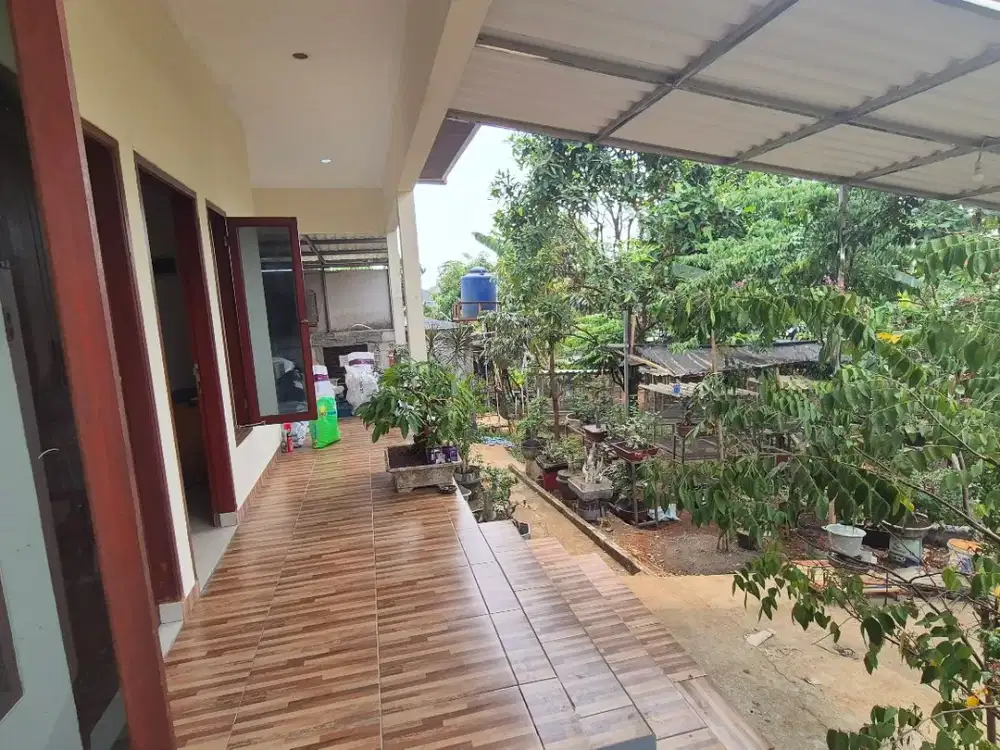 Rmh Kebun dg fasilitas ternak Aviari dan ikan, lokasi ditengah kota Bekasi, akses jalan bagus, sebelah Perum Kemang Pratama 2