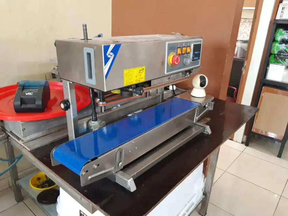 Mesin sealing vacum