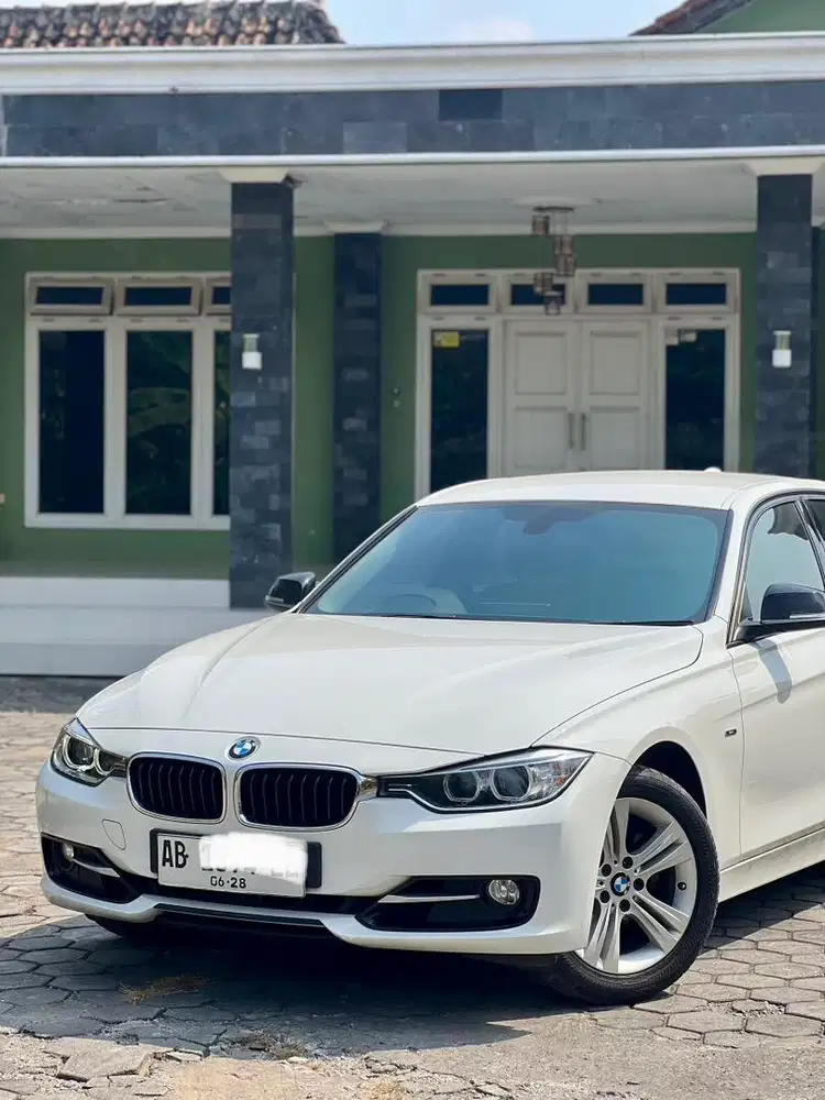 Bmw 320i 2013 asli ab,kilometer 20rb