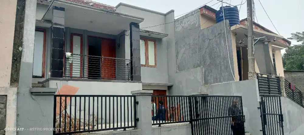 RUMAH DI DALAM PERUMAHAN ONE GATE SISTIM