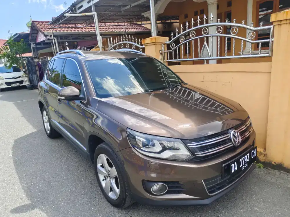 Volkswagen Tiguan 1.4 tdi at 2013