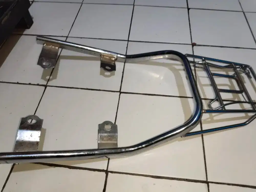 behel belakang astrea grand