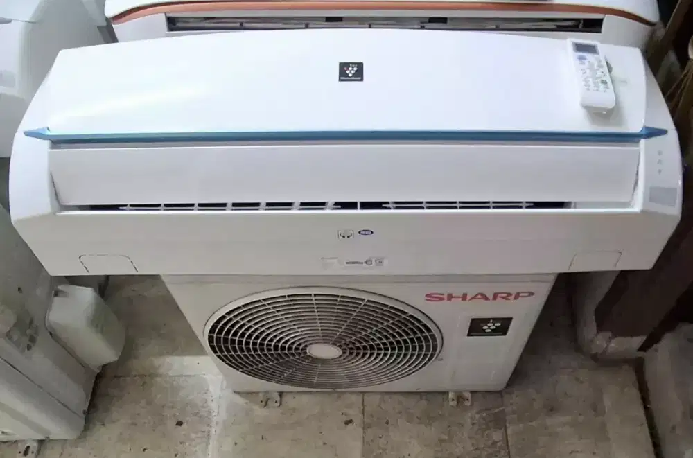 Ac bekas sharp 1 pk