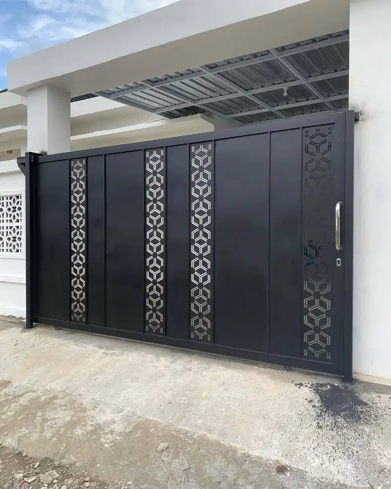 Pintu pagar rumah motif cutting