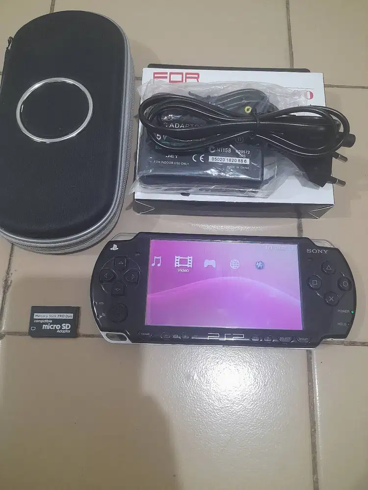 Psp slim seri 2000 Mulus Memory 8gb Fullgame Plus Carjer dan dompetnya
