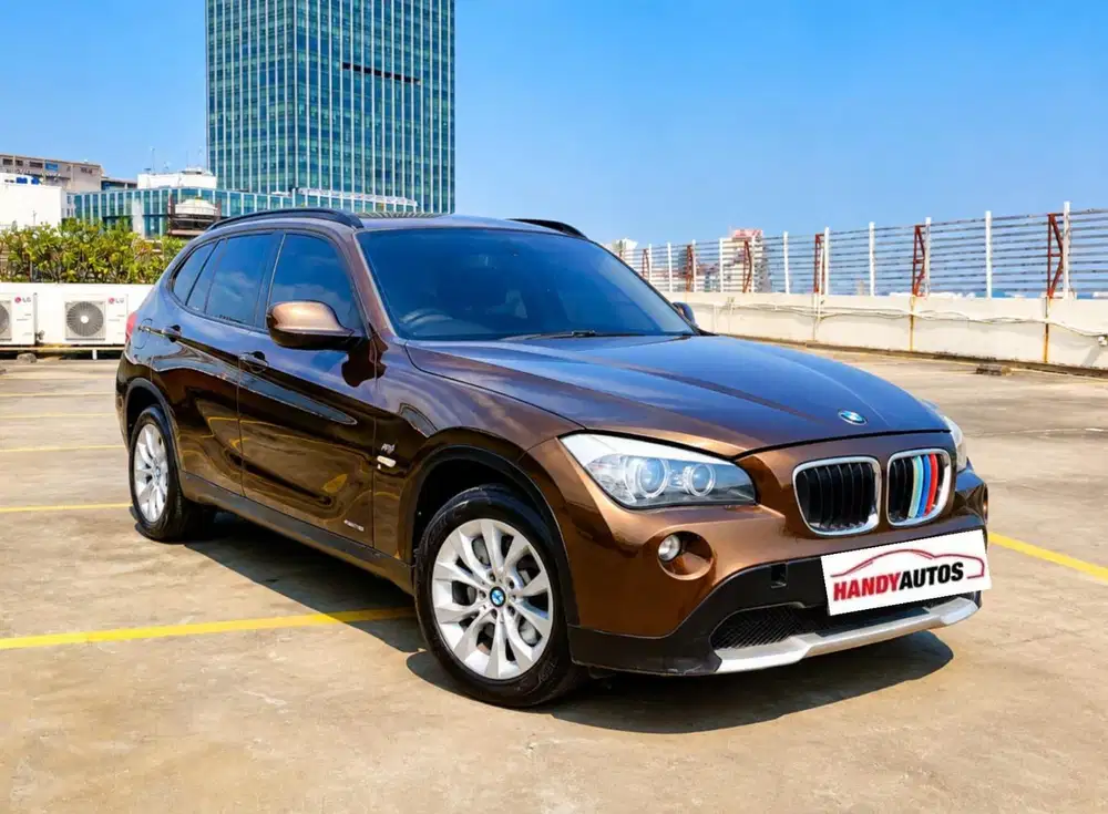 BMW X1 Executive 2011 Automatic Coklat Metalik