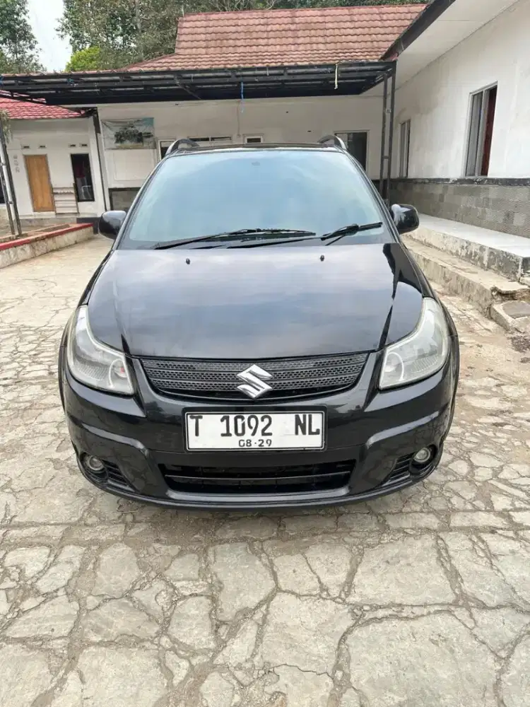 Suzuki x over THN 2009 manual