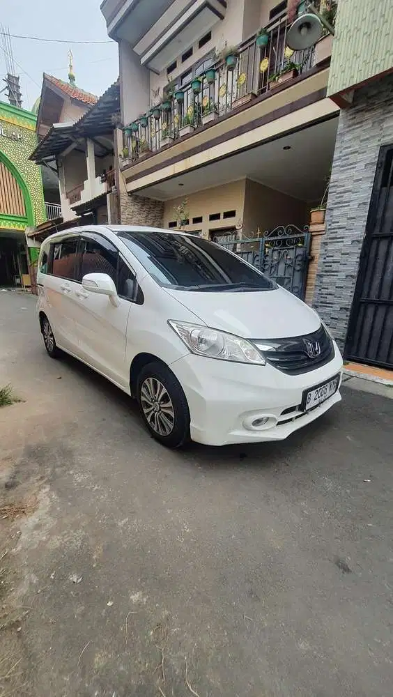 Freed SD AC Doble 2013 (DP 5jt)