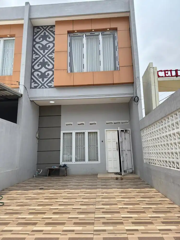 Jual rumah tengah kota (over kredit)