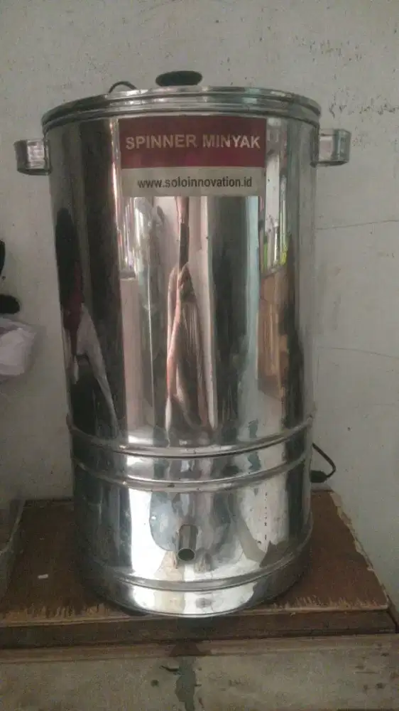 Spinner Peniris Minyak